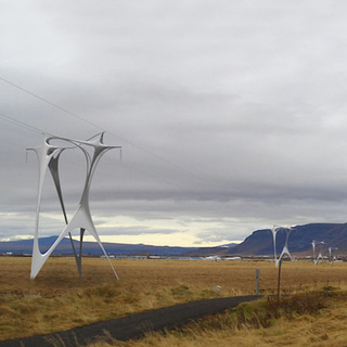 Illustration for article titled These Beautiful Giant Sculptures Support Power Lines With Style